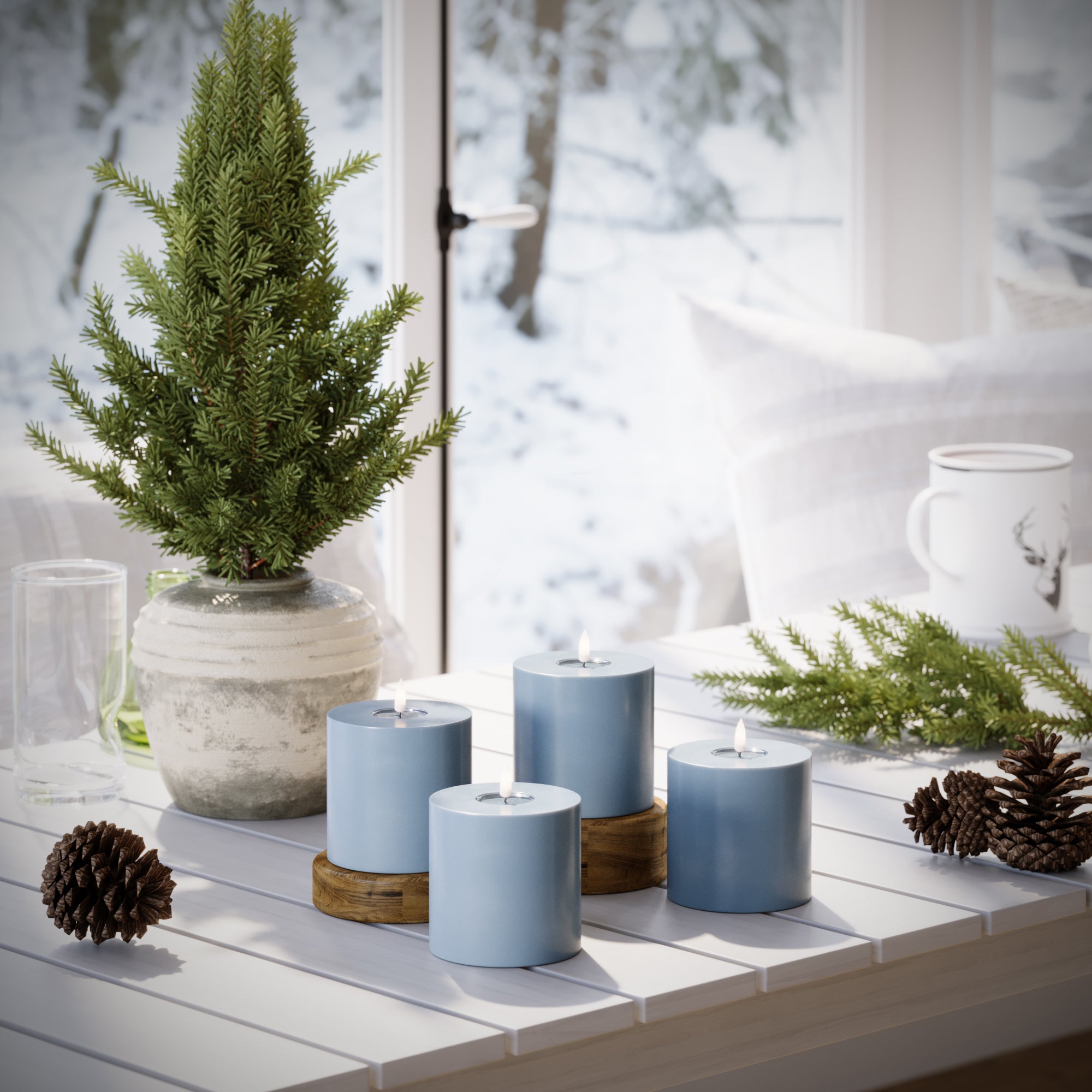 LED-Blockkerzen Ø 10 x 10 cm Eisblau – 4 Stück